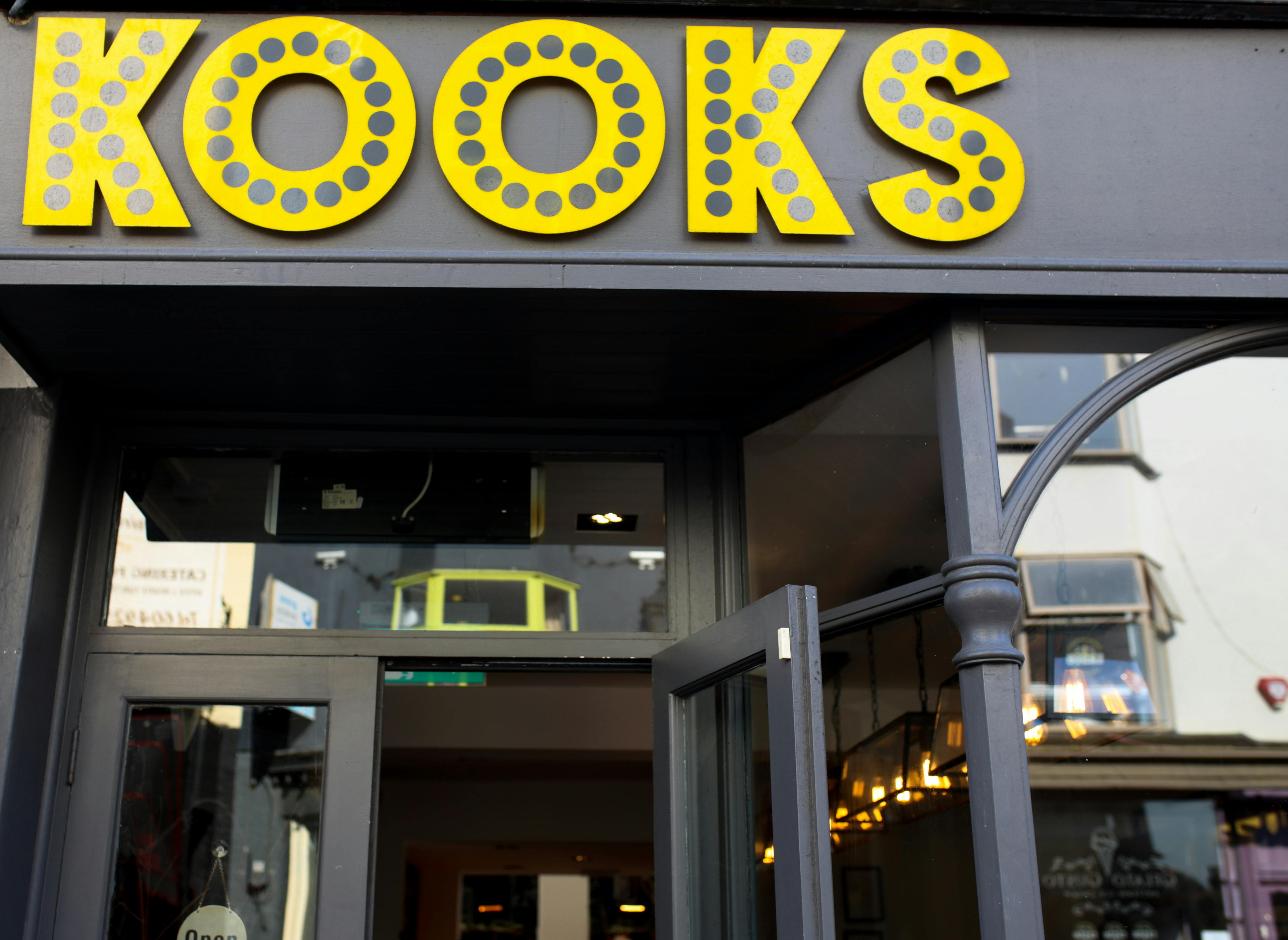 Vibrant Kooks Restaurant entrance, ideal for casual meetings and events.