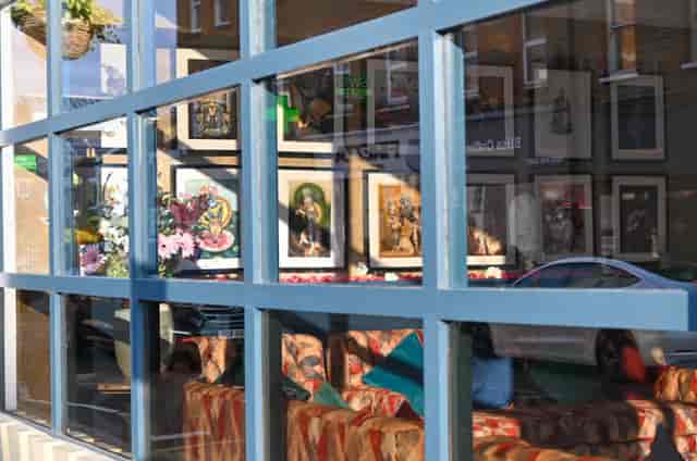 Private dining venue with large windows, ideal for networking events and casual meetings.