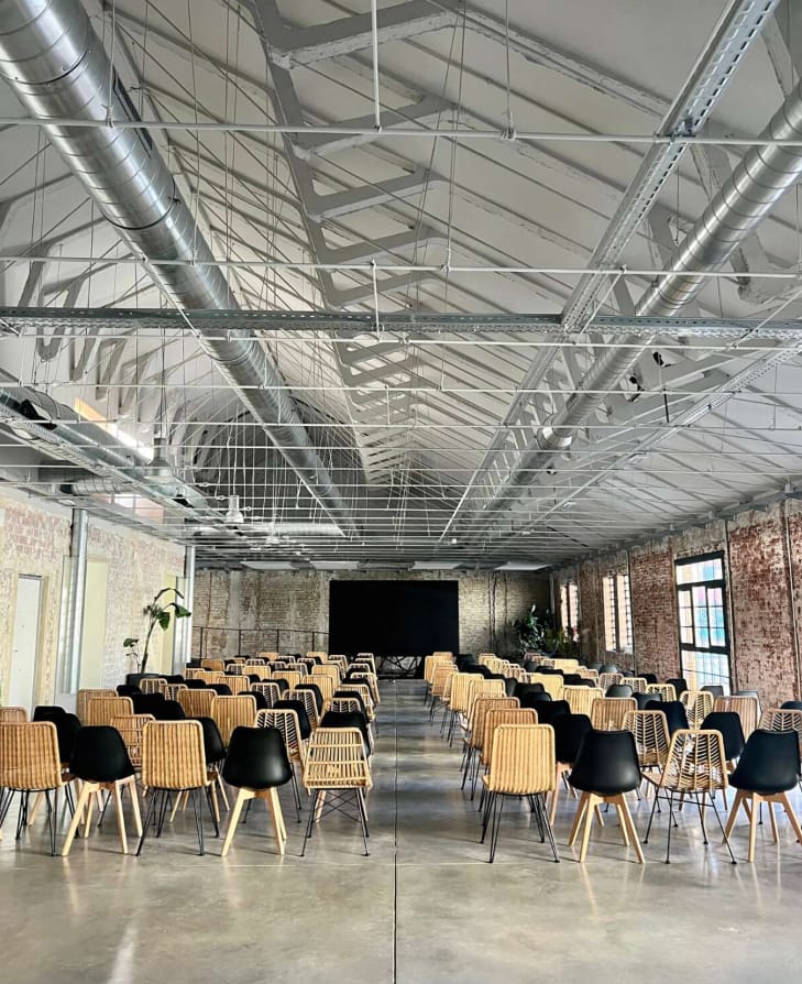 Versatile event space with stylish seating, ideal for conferences and workshops.
