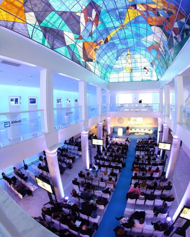 Venus Room at Palacio Neptuno: tiered seating for engaging conferences and presentations.