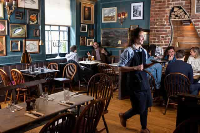 Sophisticated Lore of the Land restaurant interior for corporate networking and business lunches.
