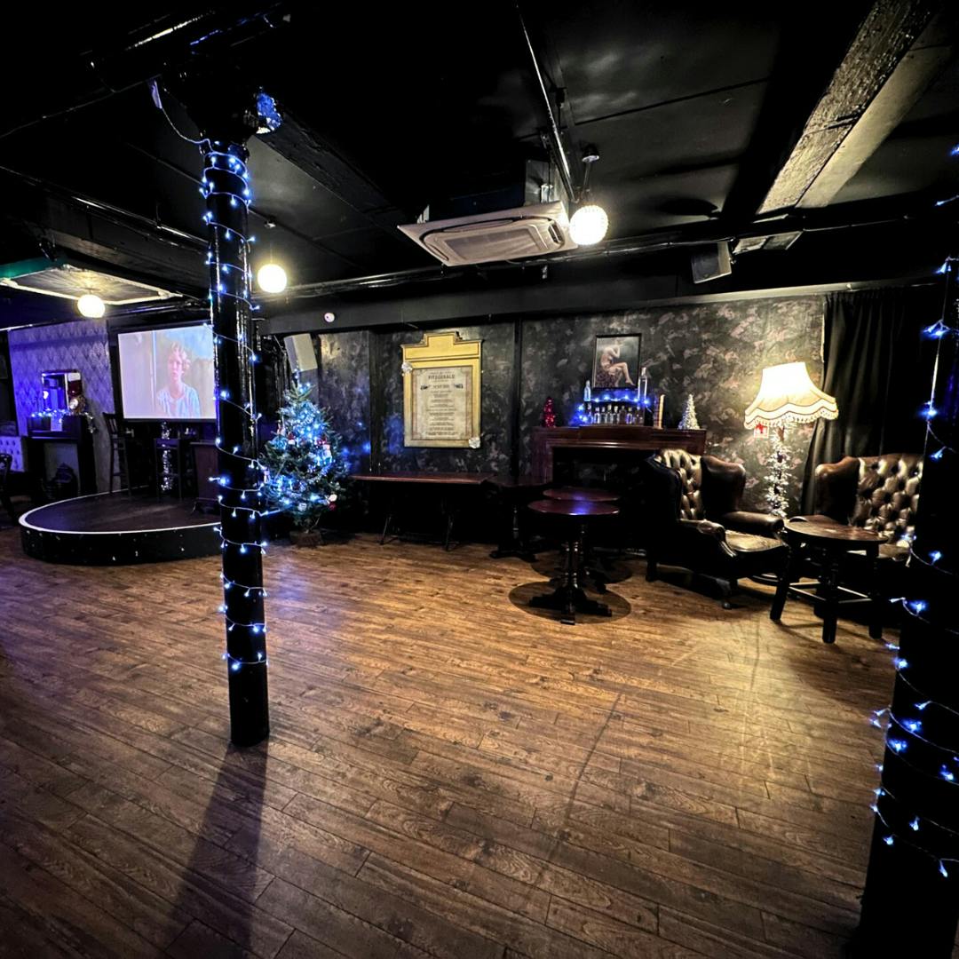 Cozy event space at The Fitzgerald Manchester with plush seating and multimedia capabilities.