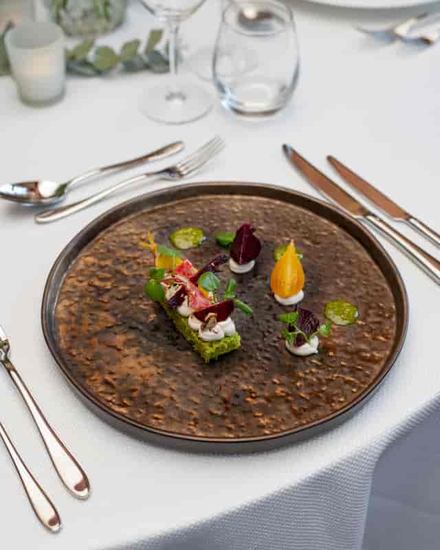 Elegant Christmas dinner setup at Brewers' Hall with meticulous plating and fine dining.