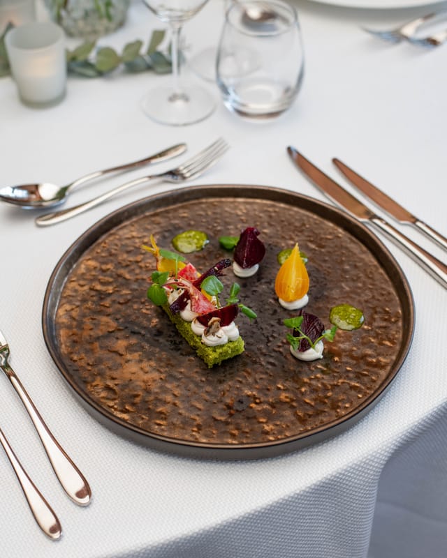 Elegant Christmas dinner setup at Brewers' Hall with meticulous plating and fine dining.