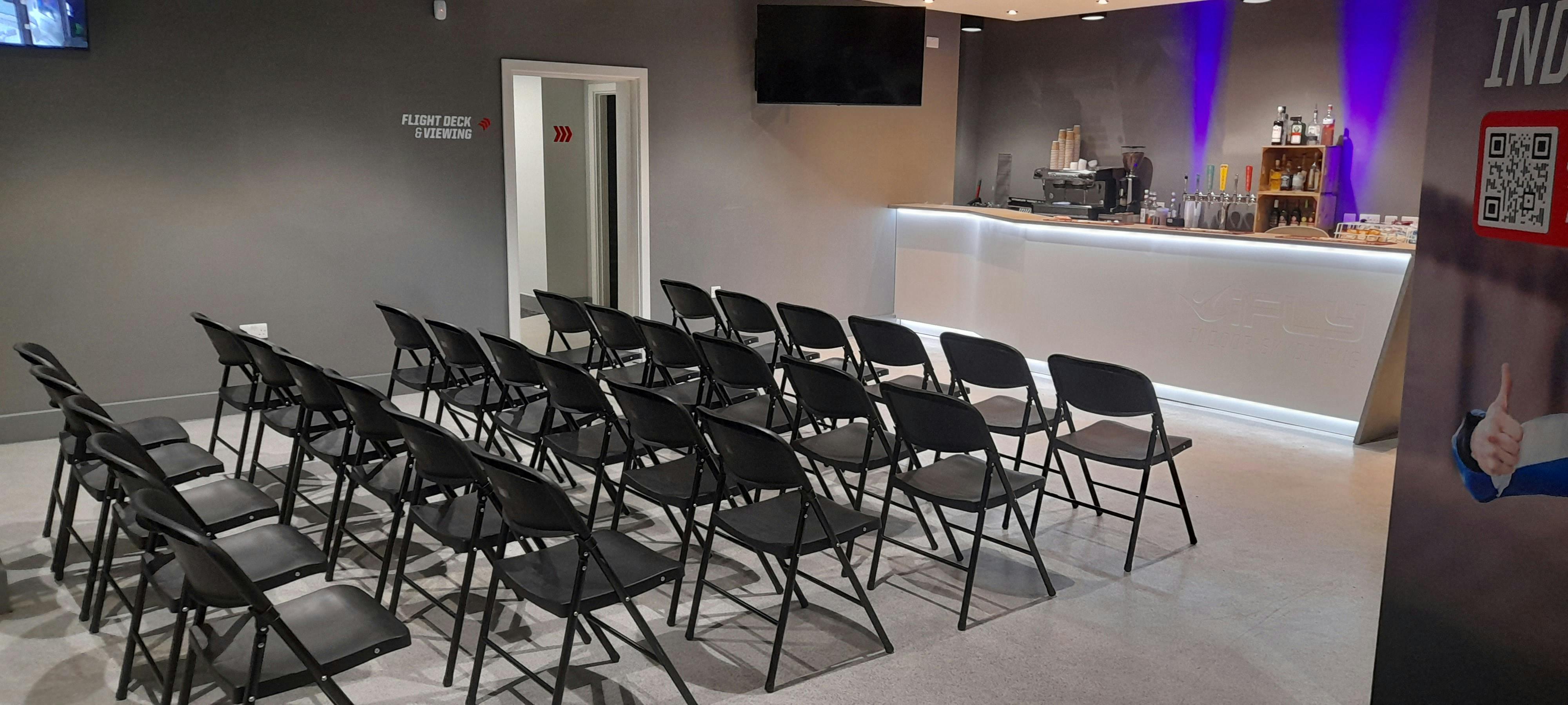 iFLY Indoor Skydiving event space with modern design, ideal for presentations and workshops.