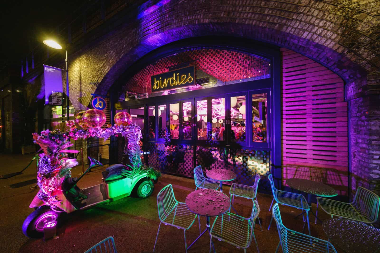 Vibrant Birdies Crazy Golf entrance with colorful lighting for lively events and gatherings. - Banner