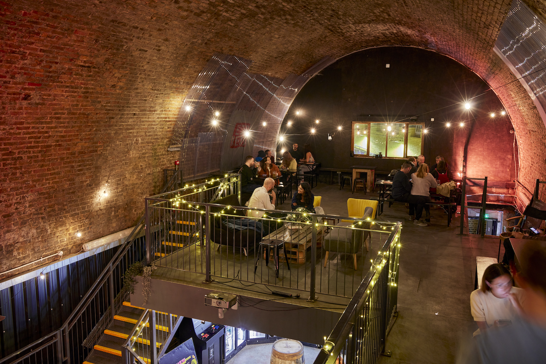 Craft Metropolis Brixton venue with exposed brick, perfect for casual events and networking. - Banner