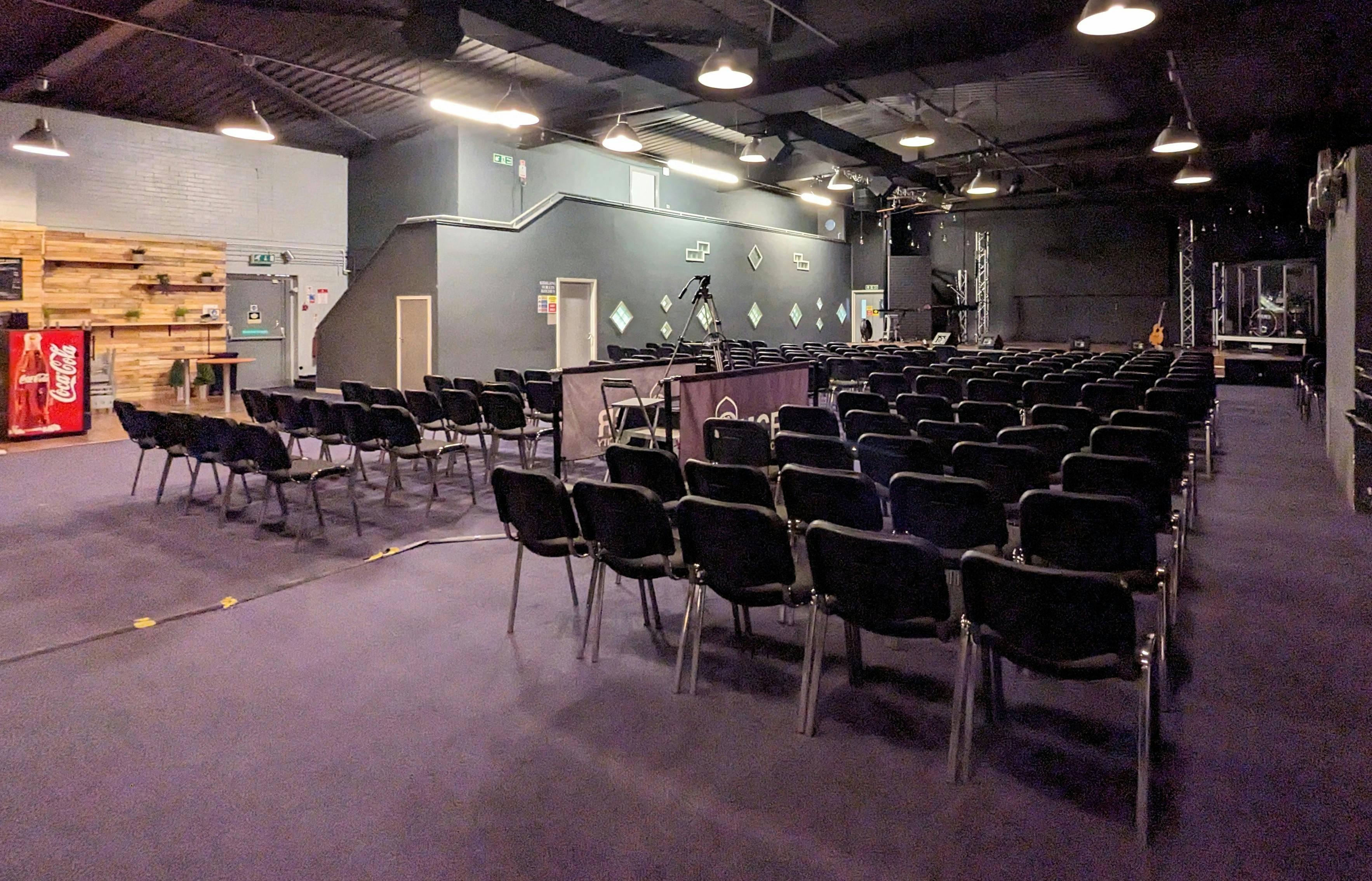 Large Function Hall in Victory Outreach Manchester, set for a professional presentation.