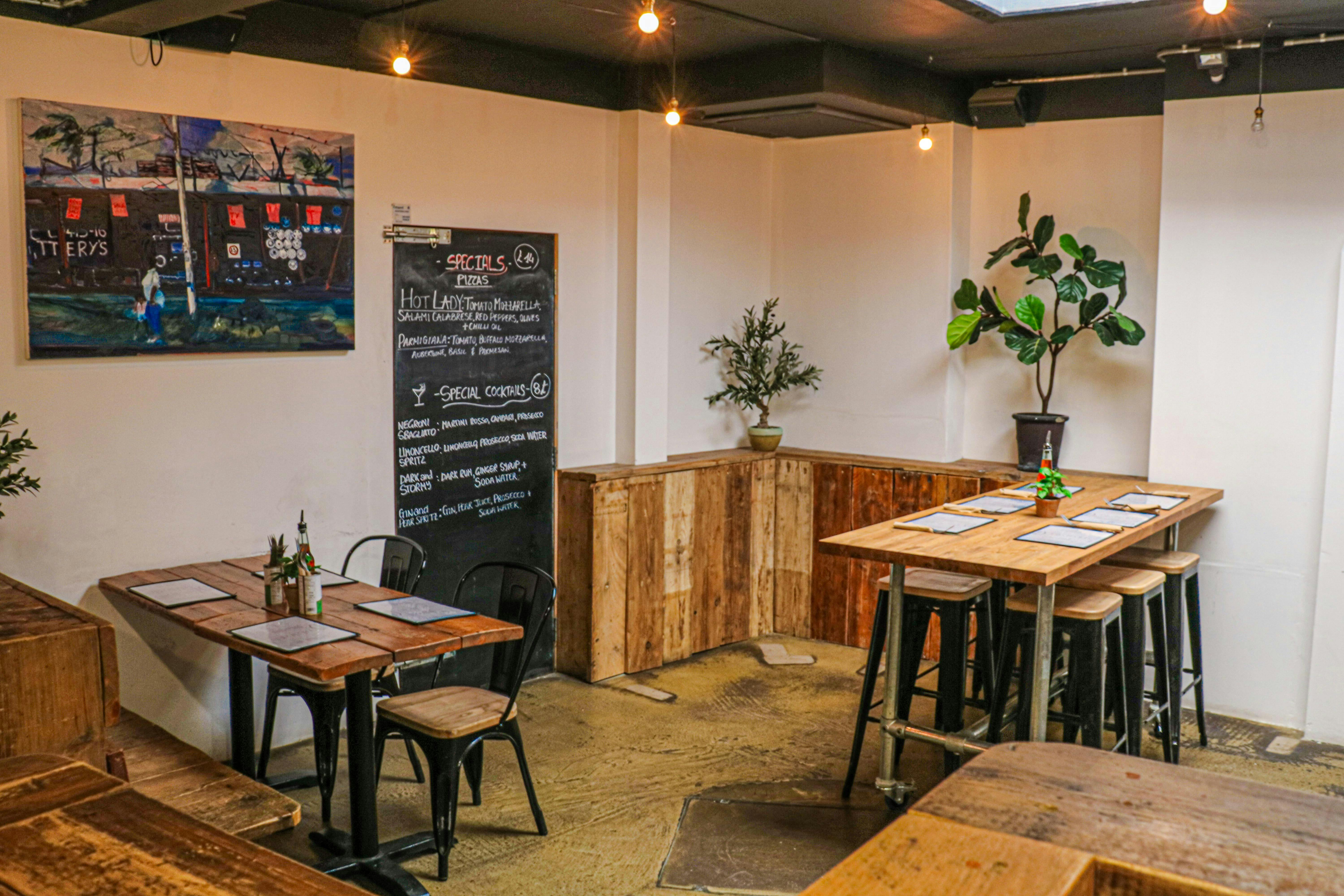 Cozy dining space at Mamma Dough Peckham, perfect for casual meetings and events.