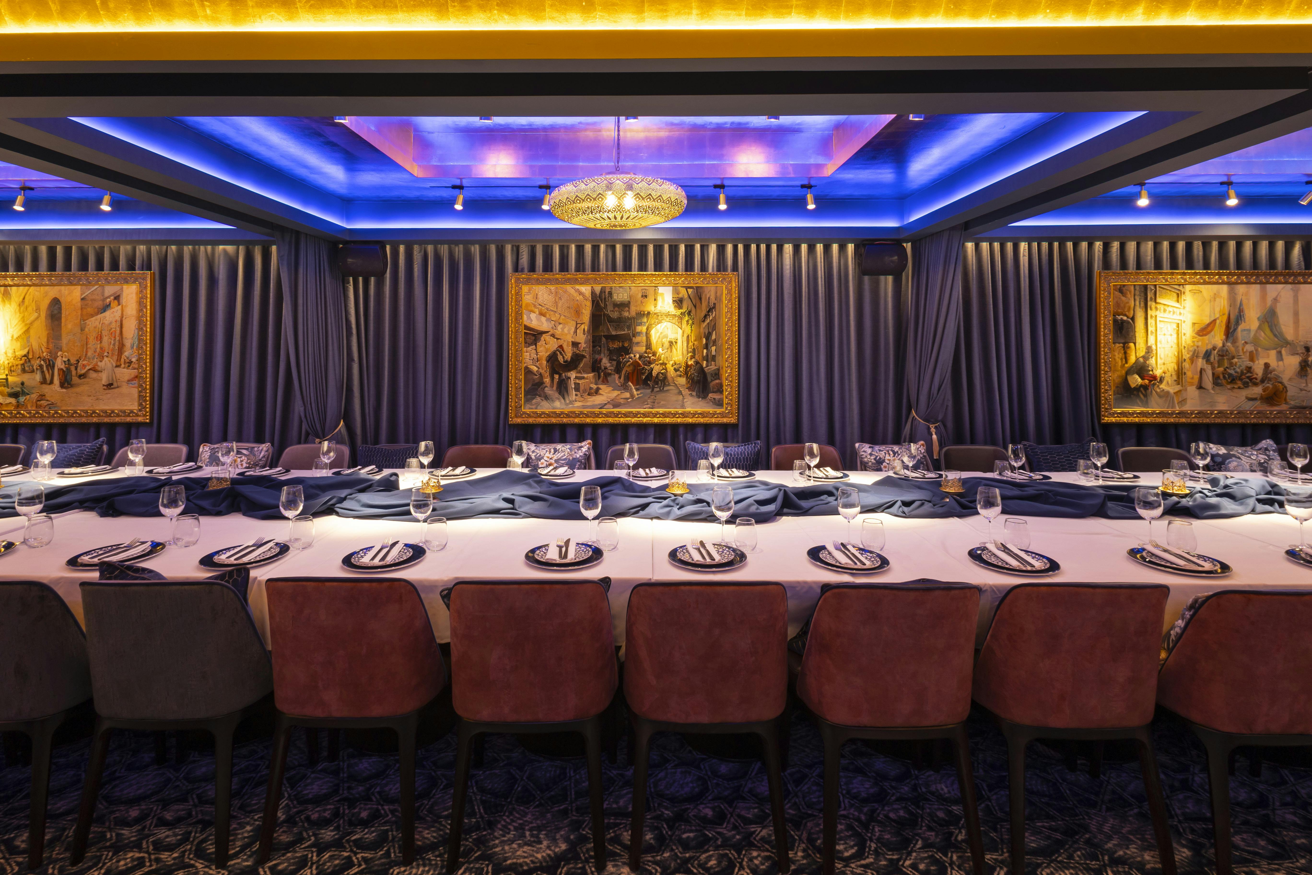 Elegant dining room in Sapphire Room, Jeru; ideal for intimate gatherings and corporate dinners.