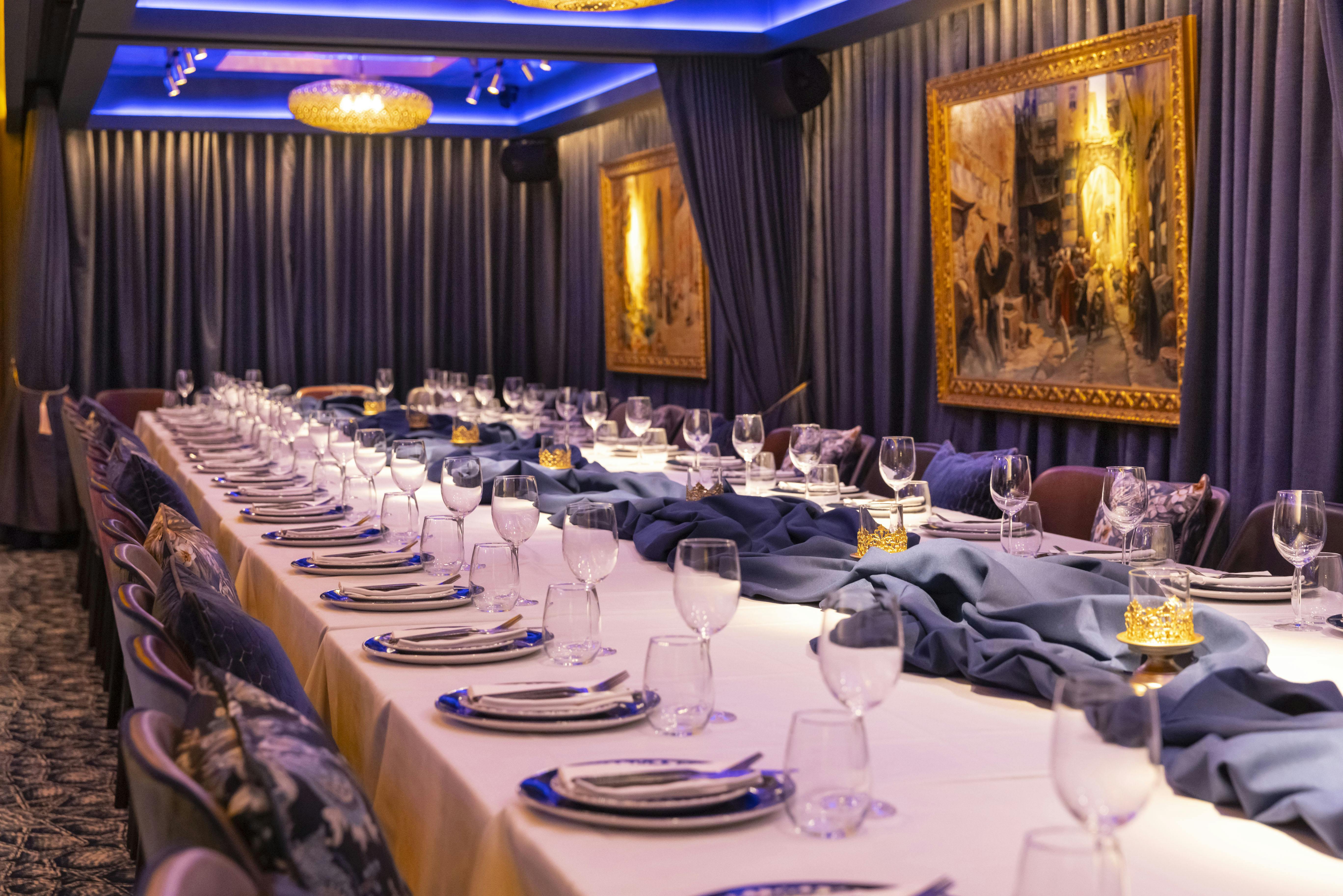 Elegant long table in Sapphire Room, Jeru, ideal for intimate gatherings and corporate dinners.