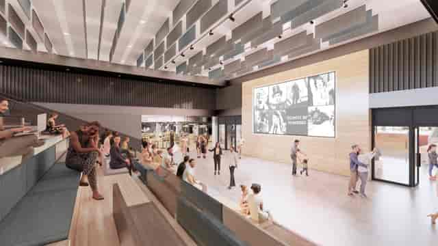 Modern auditorium with tiered seating for versatile events and presentations.