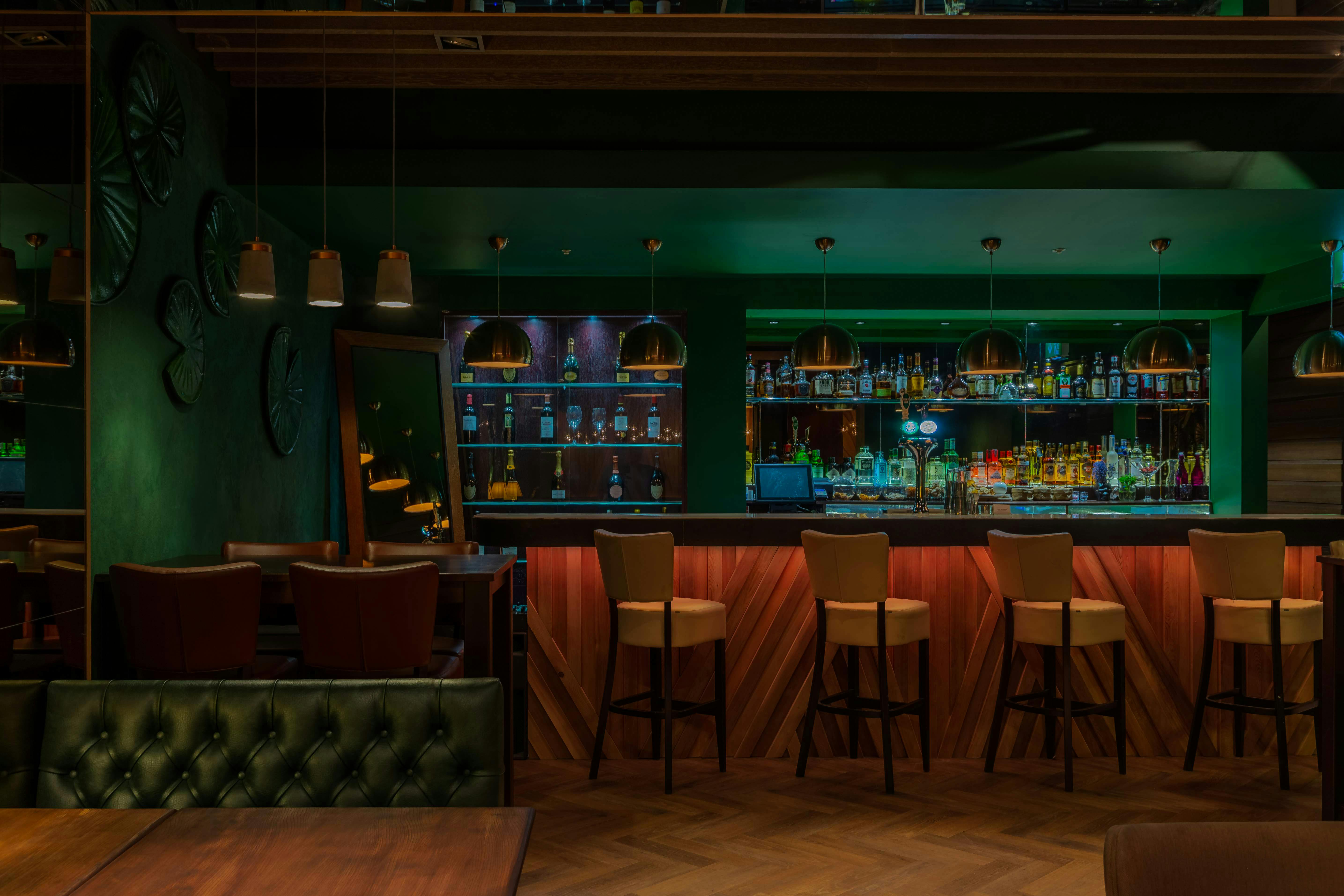 Stylish bar area in Ayllu for upscale networking events and cocktail receptions.