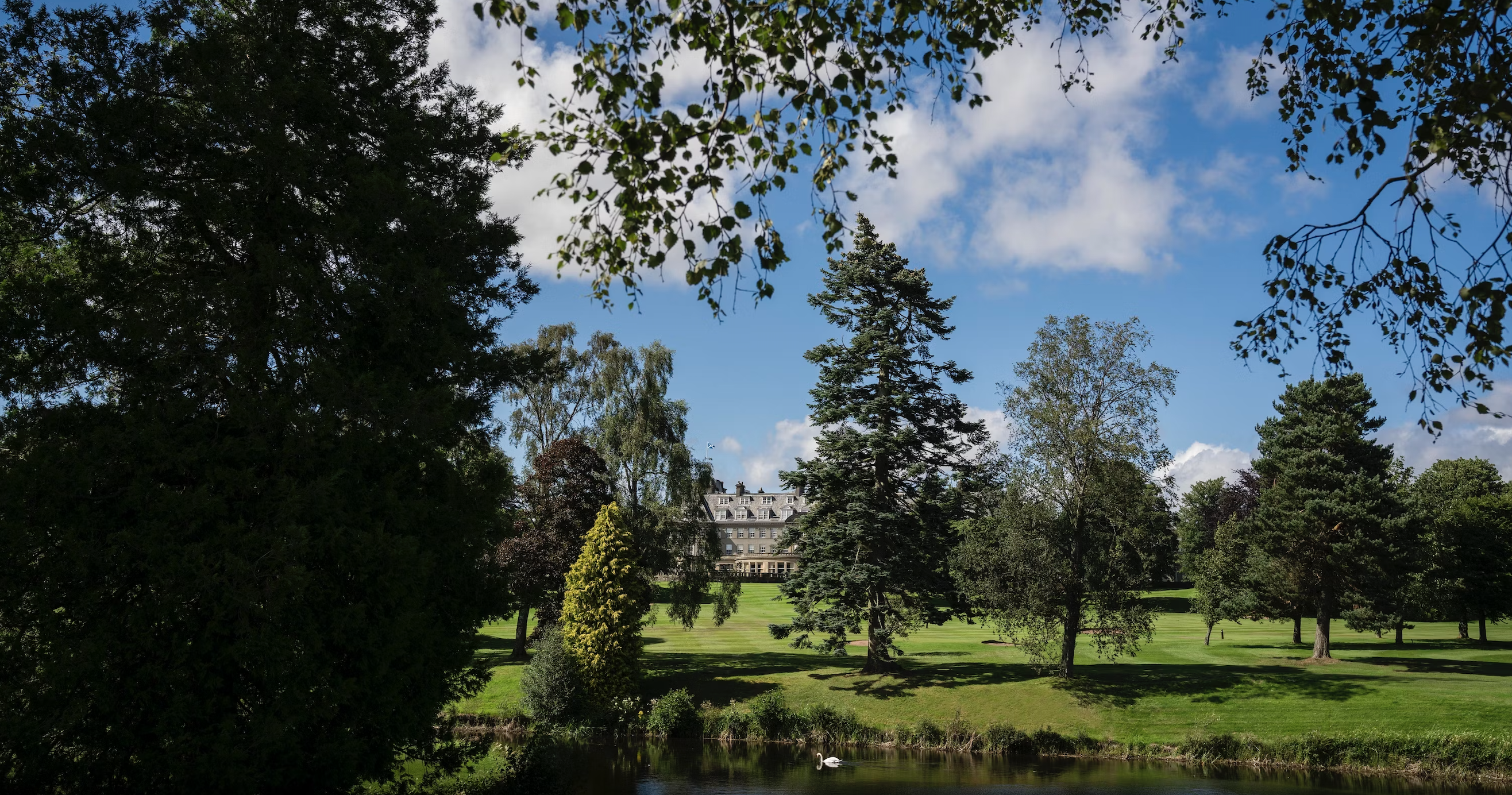 Henry Hall at Gleneagles Hotel, lush greenery venue for weddings and corporate events.