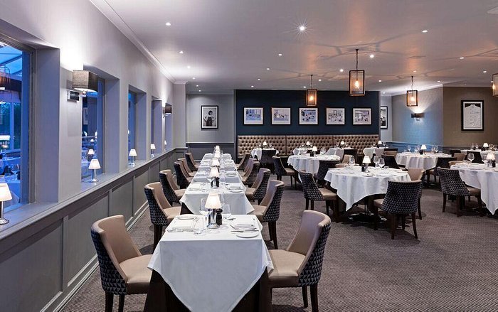 Hinckley Meeting Rooms with elegant dining setup for corporate events and gatherings. - Banner