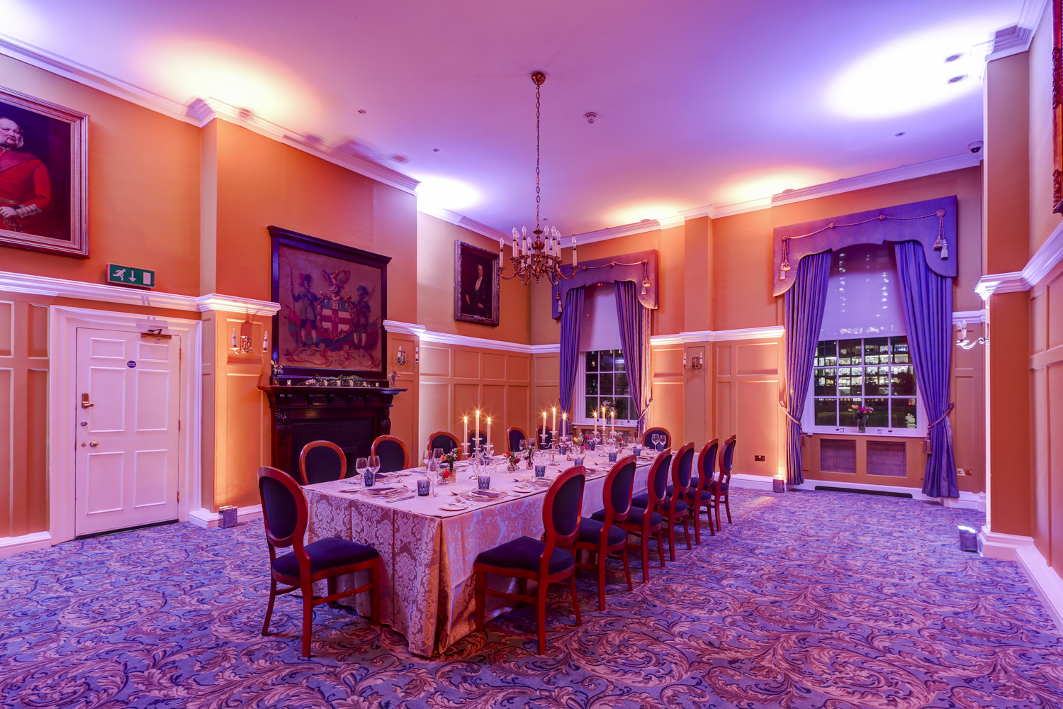 Elegant Queen's Room at HAC, perfect for upscale dinners and intimate gatherings. - Banner