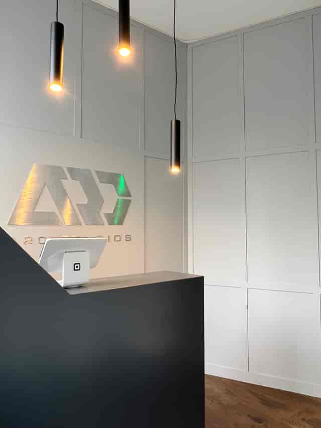 Sleek reception area in ARC STUDIOS for corporate events with modern design and branding.
