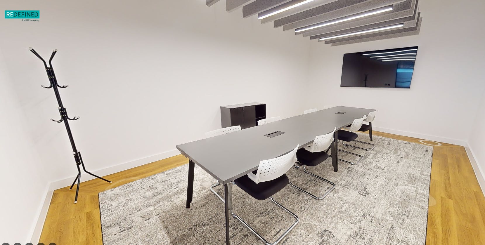 Modern meeting room in Louisa Ryland House with ergonomic chairs for collaboration.