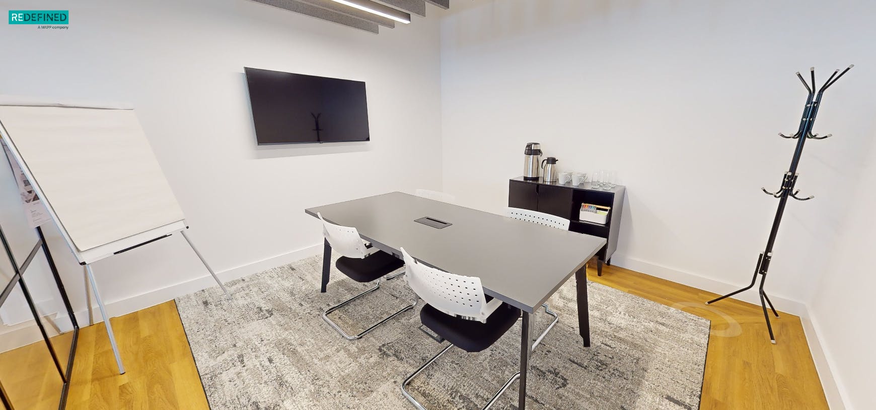 Modern meeting room in Louisa Ryland House, ideal for collaborative brainstorming sessions.