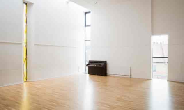Elegant hardwood event space in St John's Church Waterloo, perfect for meetings and workshops.