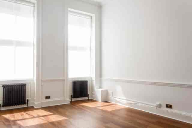 Otto Room meeting space with natural light, ideal for workshops and gatherings.