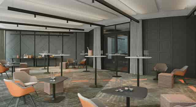 Modern event space in W Edinburgh with high-top tables for networking and receptions.