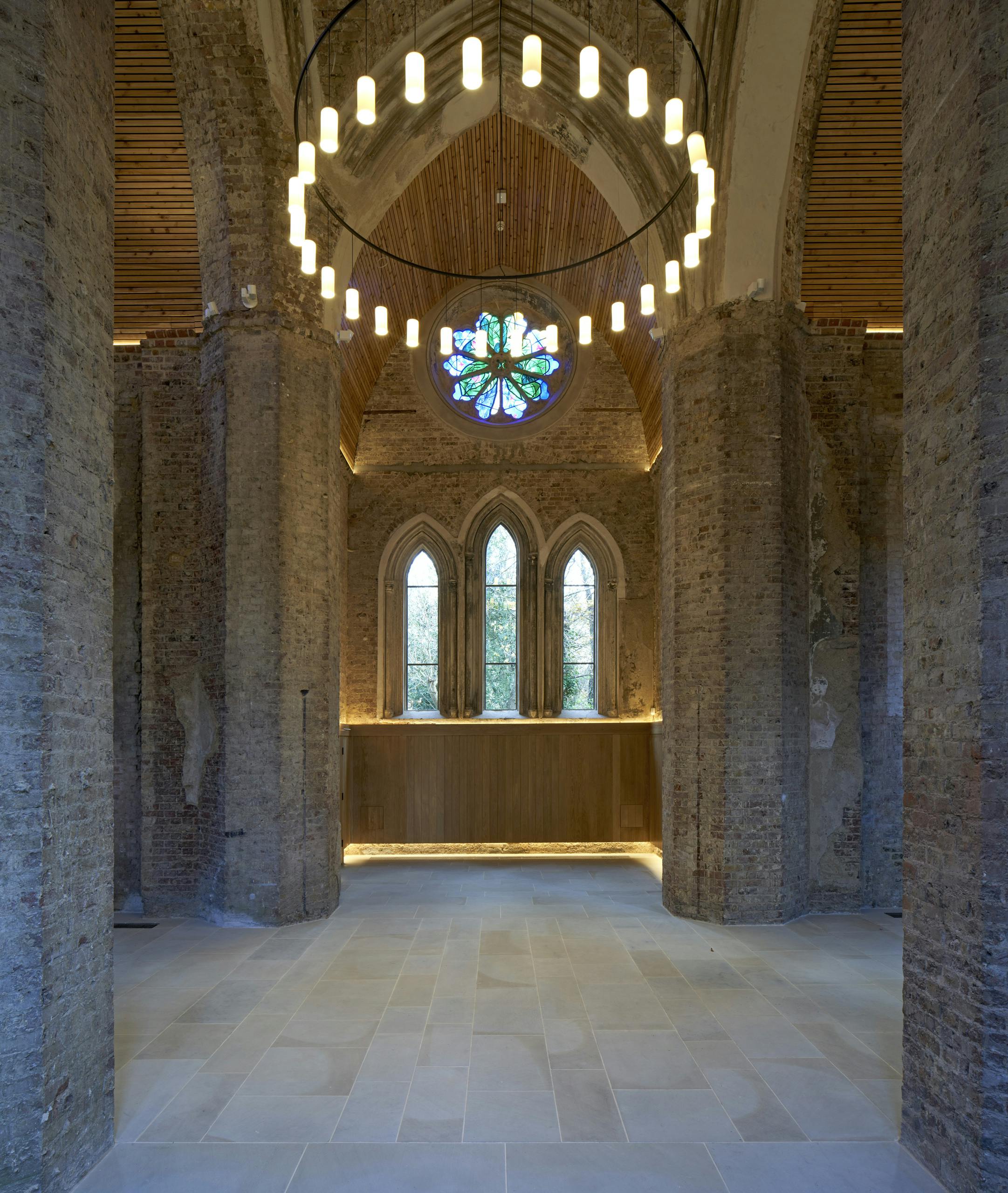 Whole Venue in Abney Park Chapel with stained glass, perfect for weddings and events.