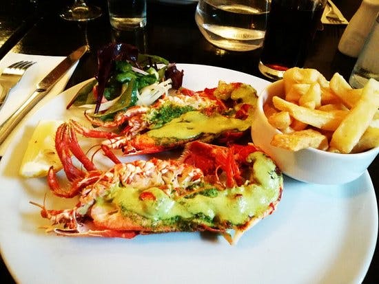 Upscale lobster dish at Mourne Seafood Bar, perfect for corporate events and celebrations.