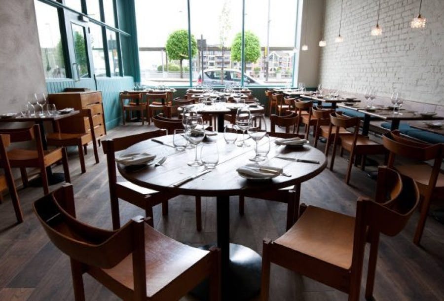 Flame Restaurant in ICC Belfast, modern setting for corporate events and gatherings.