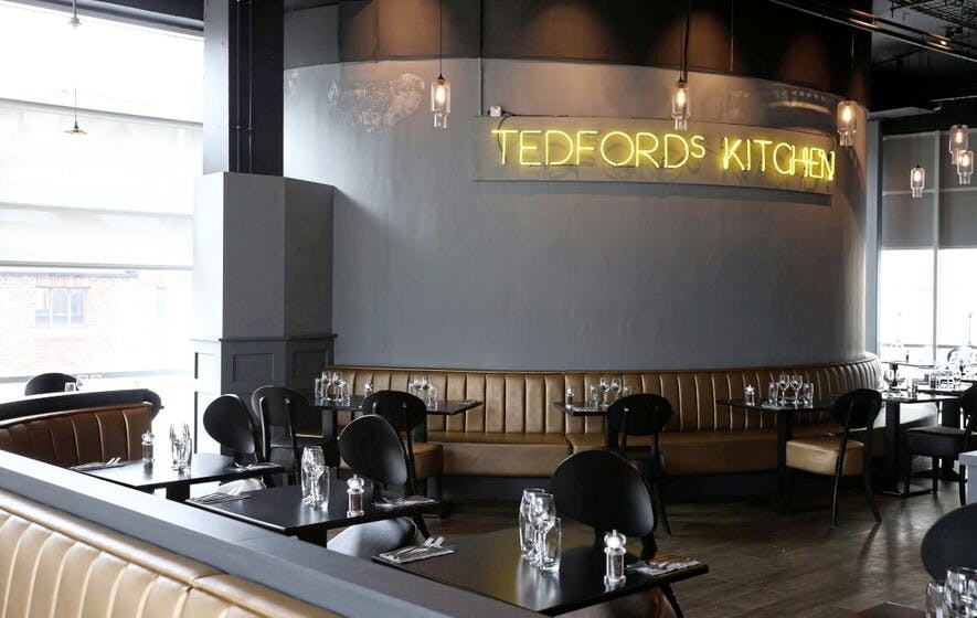 Tedfords Kitchen at ICC Belfast, modern restaurant with booth seating for events and meetings.