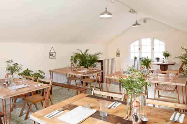 Charming event space in Spinach East Dulwich with rustic decor for workshops and gatherings.