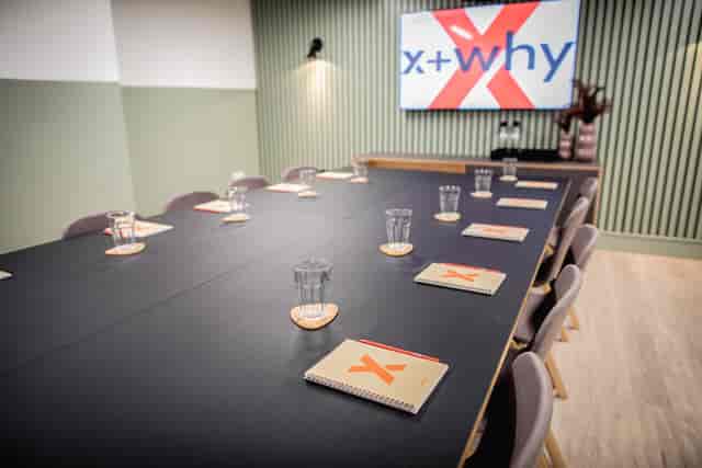 Modern meeting room at Fulwood Place with long table, ideal for workshops and presentations.