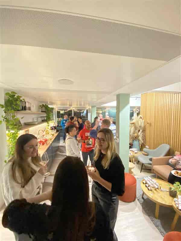 Vibrant networking event at Fulwood Place with buffet setup and modern decor.