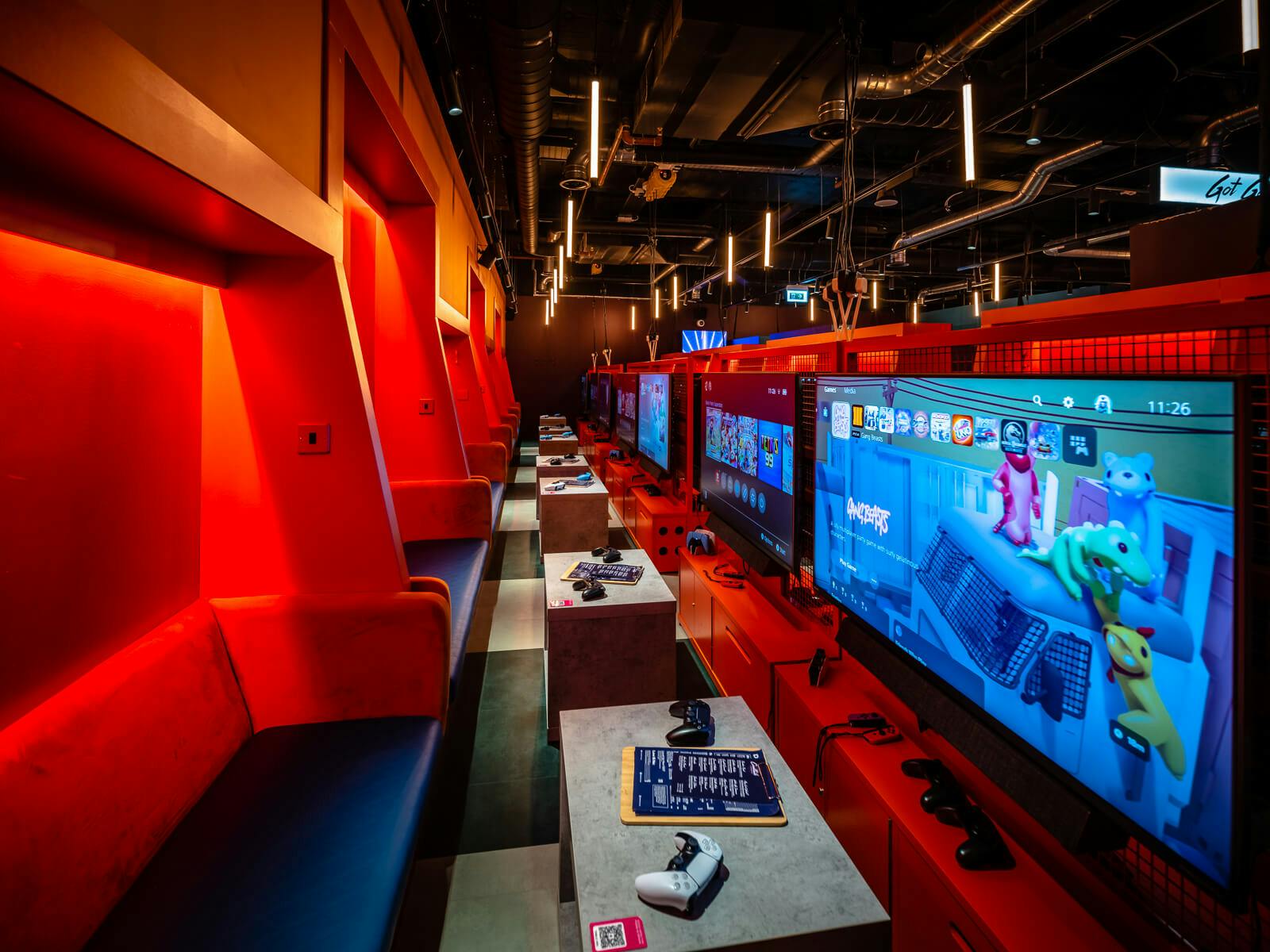 Orange Gaming Lounge at Canary Wharf with vibrant decor for esports tournaments and events.