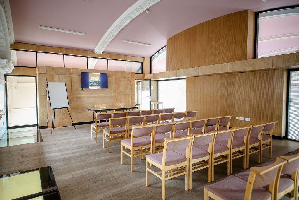 Modern meeting space in Abbeyhill, Edinburgh with natural light, ideal for workshops and events.