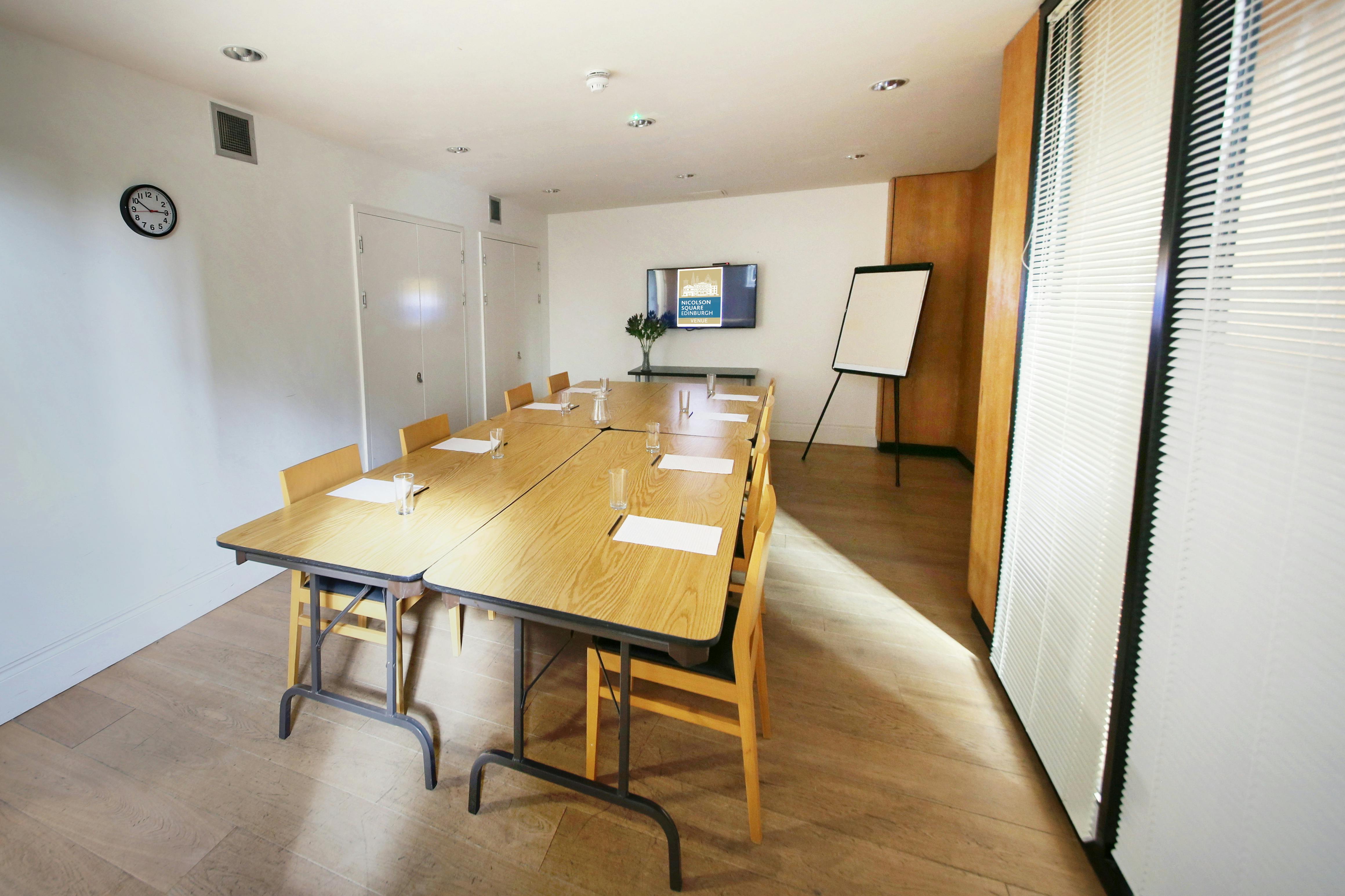 Meeting room in Nicolson Square, Edinburgh with natural light for professional gatherings.