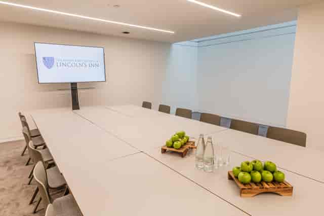 Lincoln's Inn boardroom, modern meeting, corporate event.