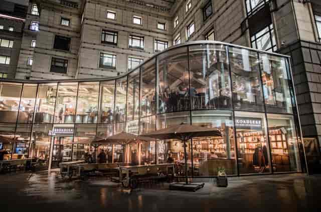 Modern Broadleaf venue with glass facade, ideal for events and gatherings.