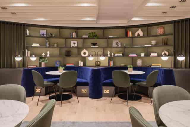 Stylish rooftop bar at The Opera with cozy seating for networking events and meetings.