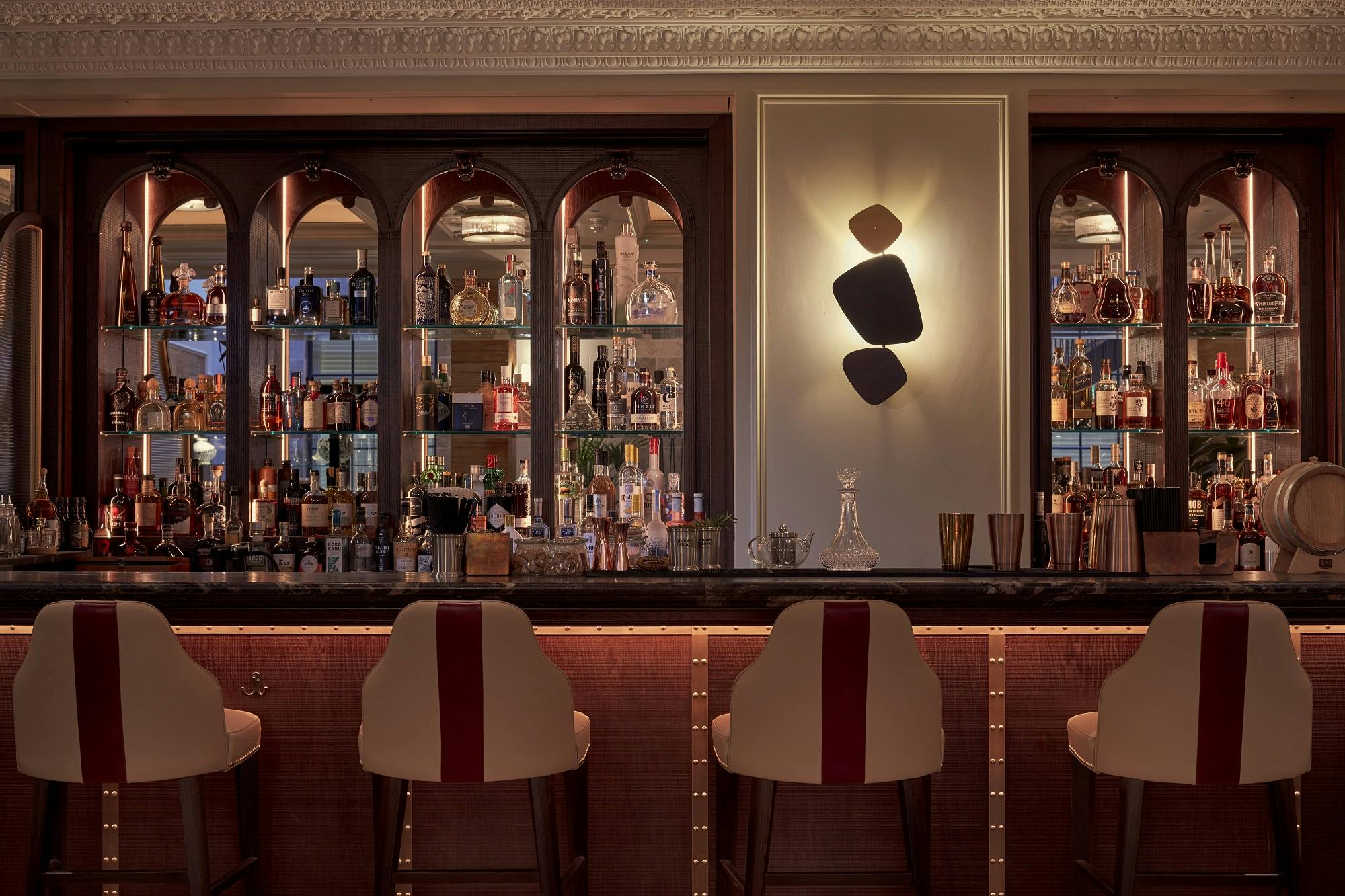 Sophisticated ESQ Bar at 100 Queen's Gate Hotel, ideal for networking and cocktail events.