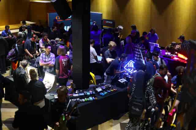 Vibrant expo space at 90 Hideout, Hackney Wick, bustling with engaged attendees.