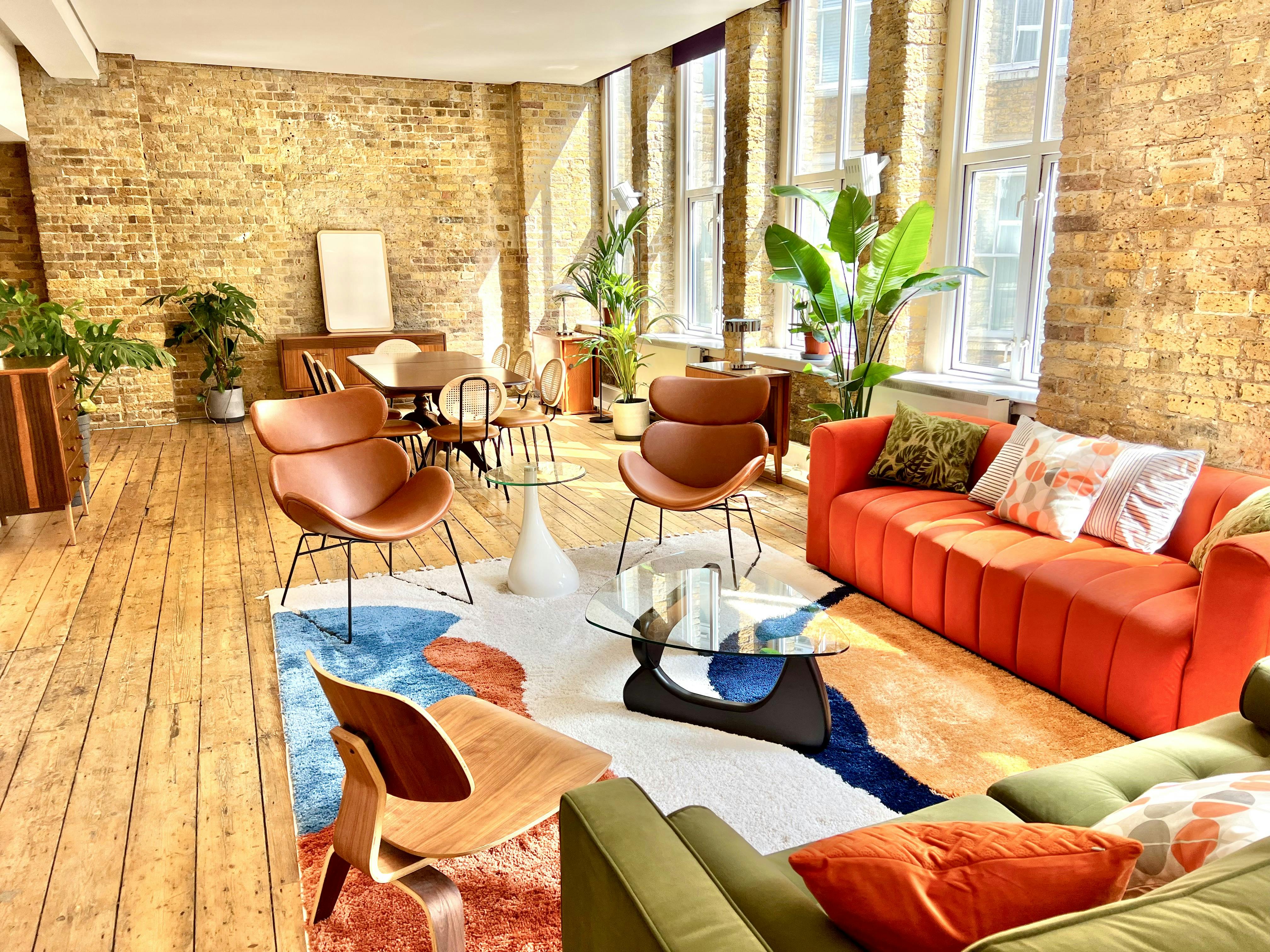 Stylish meeting space in The Artist's Loft, ideal for workshops and team-building events.