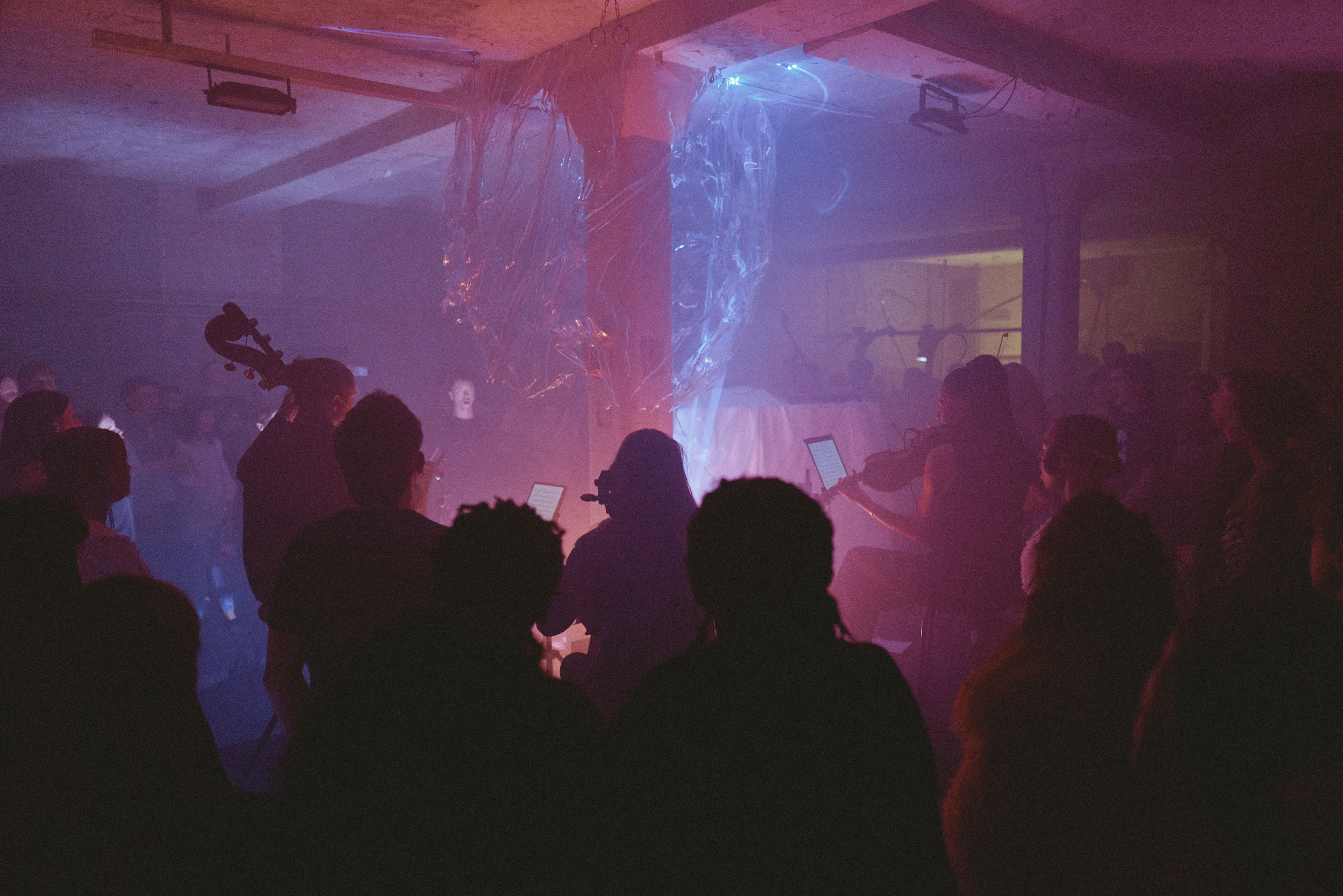 Dynamic Plantroom event space with atmospheric lighting for live performances.