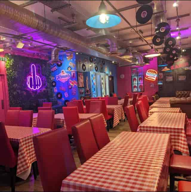 Karen's Diner in Angel London, vibrant retro event space with checkered tablecloths.