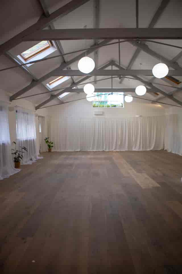 Versatile event space in The Space London with natural light and wooden floor, perfect for workshops.