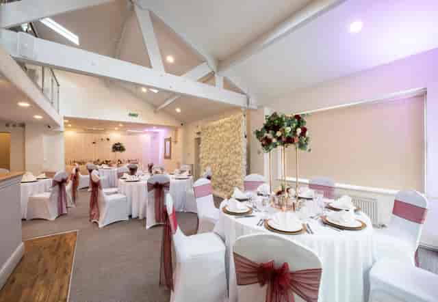 Elegant Bluebell Suite with round tables, ideal for weddings and formal gatherings.