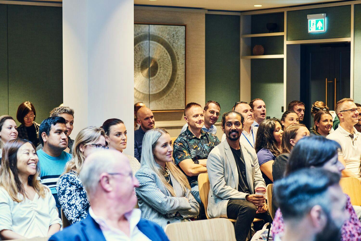 Engaged audience at Marquise event in Salisbury House, ideal for networking and learning.
