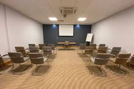Meeting room in Leonardo Hotel Exeter, featuring a whiteboard for workshops and presentations.
