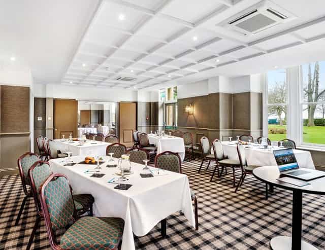 Harrogate Town Suite meeting room with elegant seating for corporate events and workshops.