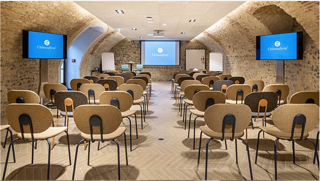 Meeting Room at Château de Herces with modern layout, ideal for corporate events.